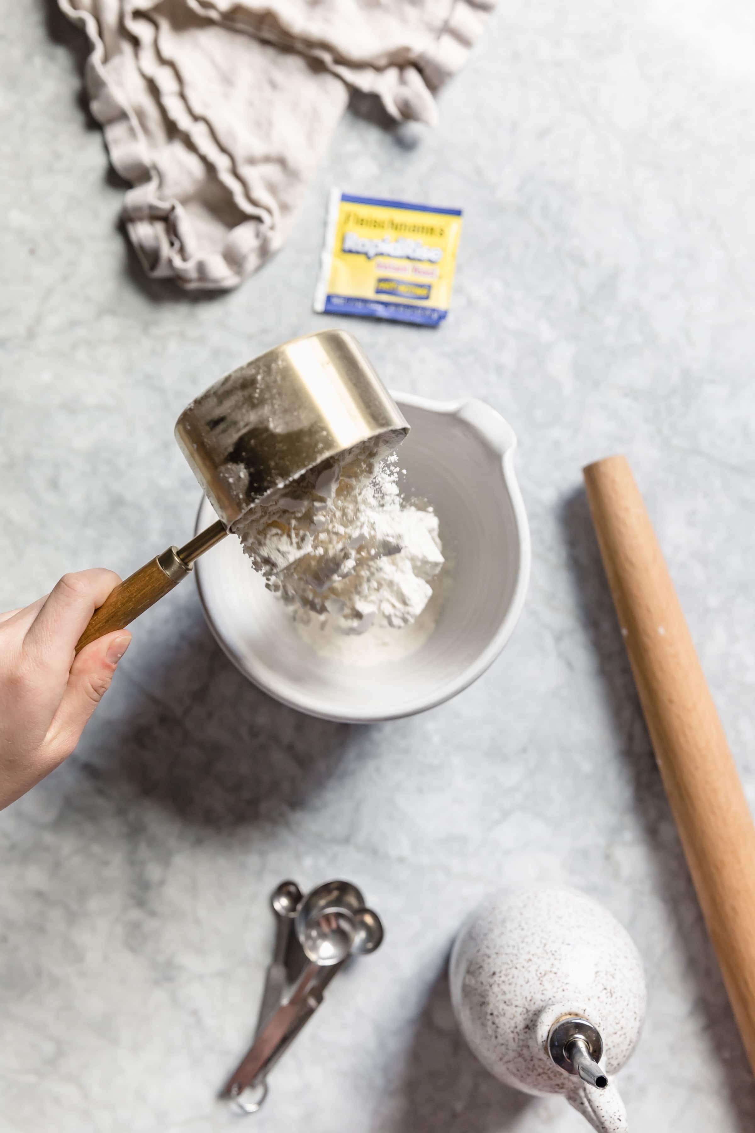 flour pouring into bowl