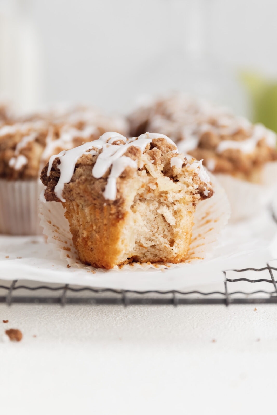 apple crumble muffin with a bite taken out