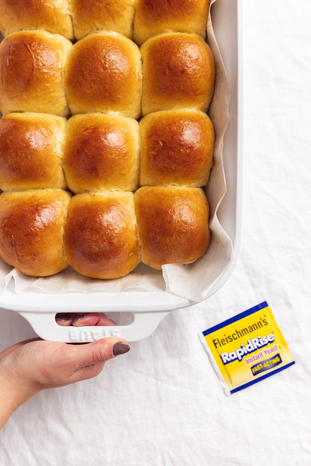 brioche dinner rolls in a pan