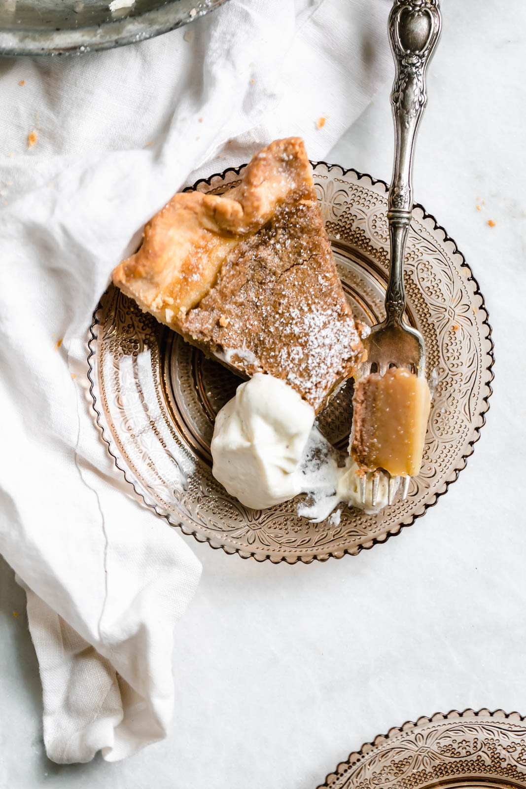 slice of Brown Butter Maple Chess Pie with whipped cream