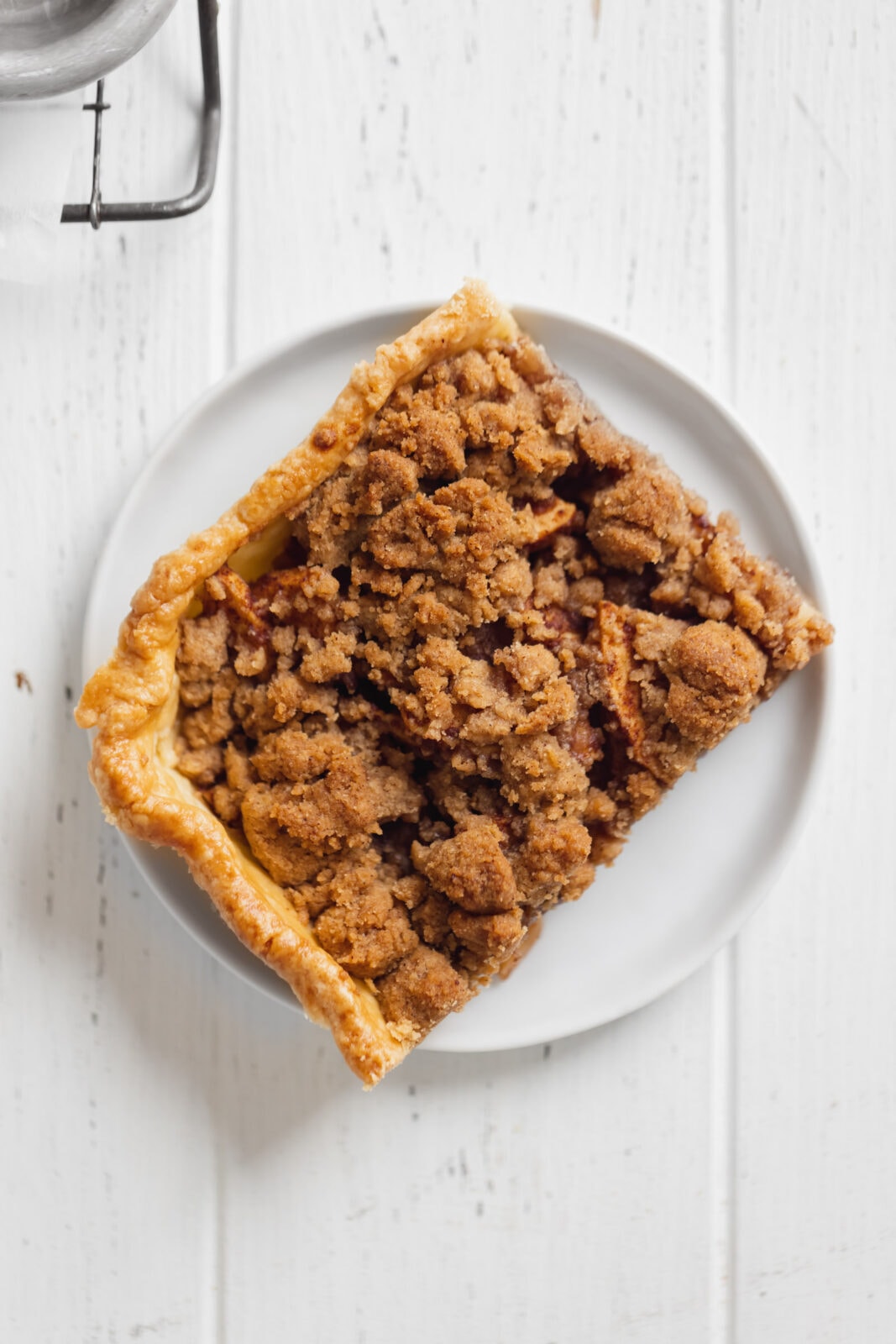dutch apple slab pie slice on a plate