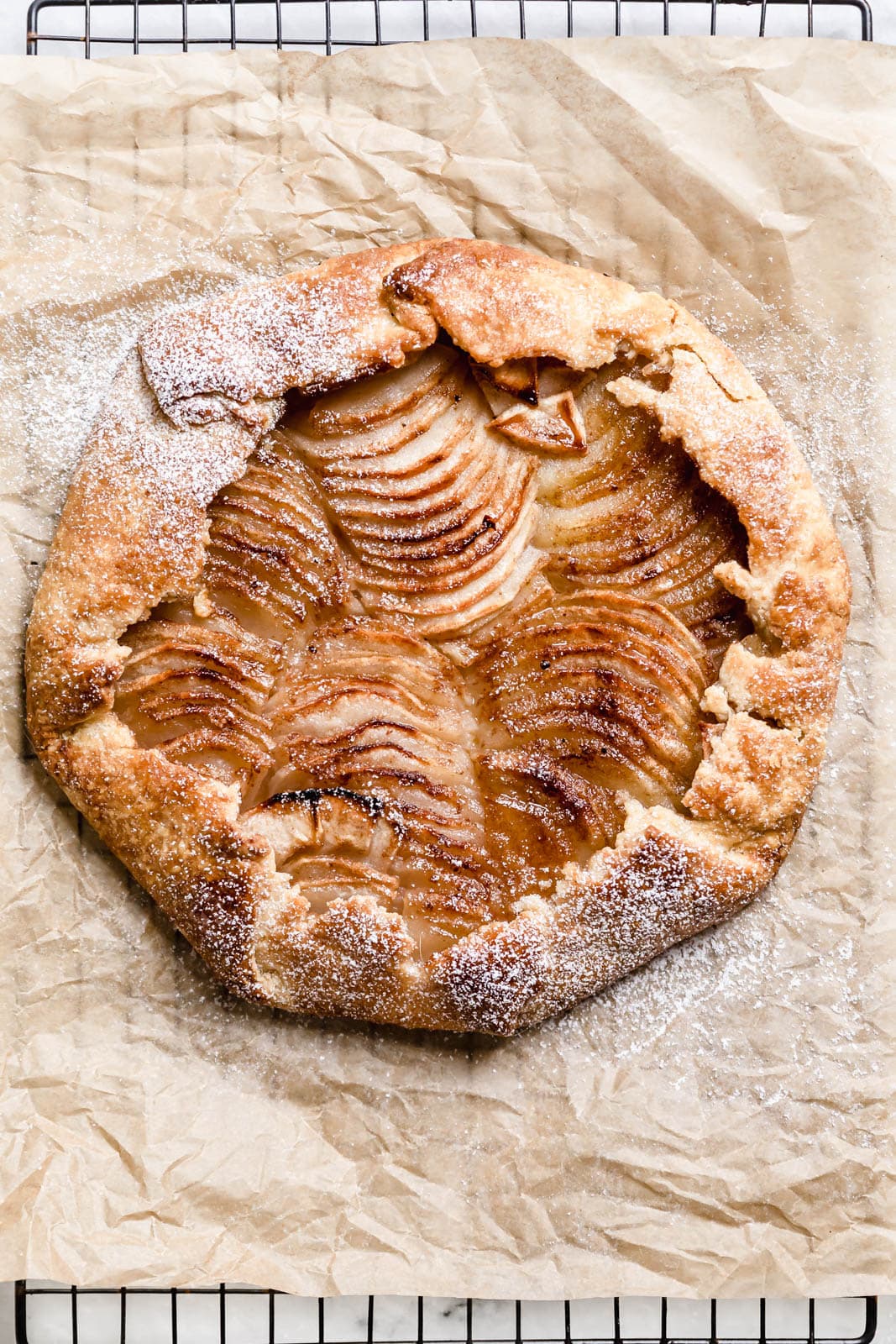 Cinnamon Apple Galette on parchment paper