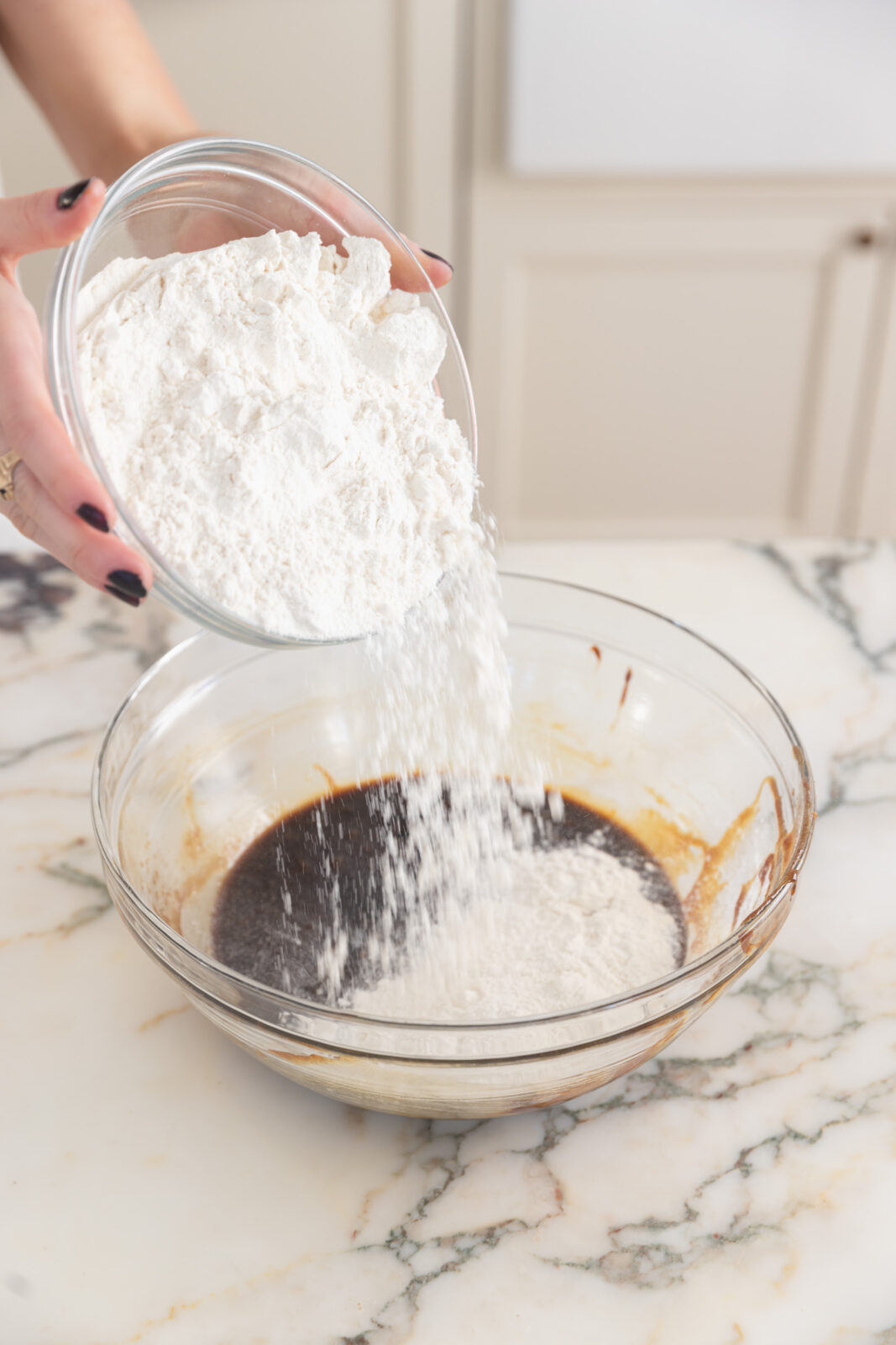 flour going into a bowl