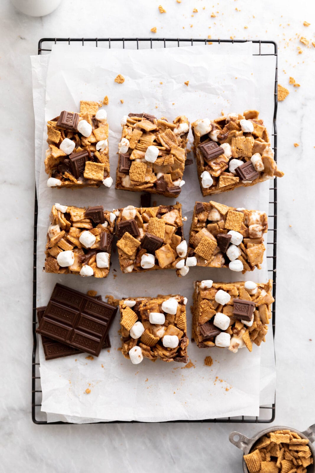 golden graham s'mores bars on a cooling rack