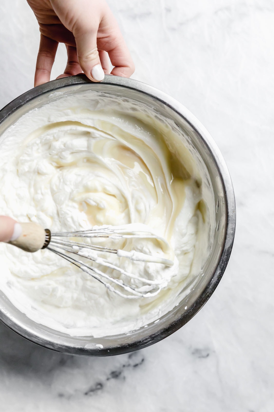 This creamy vanilla ice cream with fat blackberry swirls, buttery waffle pieces, and chocolate chips has us in heaven. Whip up this no churn blackberry waffle chocolate chip ice cream in minutes and skip the line at the ice cream shop.