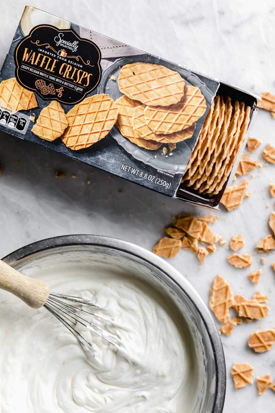 This creamy vanilla ice cream with fat blackberry swirls, buttery waffle pieces, and chocolate chips has us in heaven. Whip up this no churn blackberry waffle chocolate chip ice cream in minutes and skip the line at the ice cream shop.