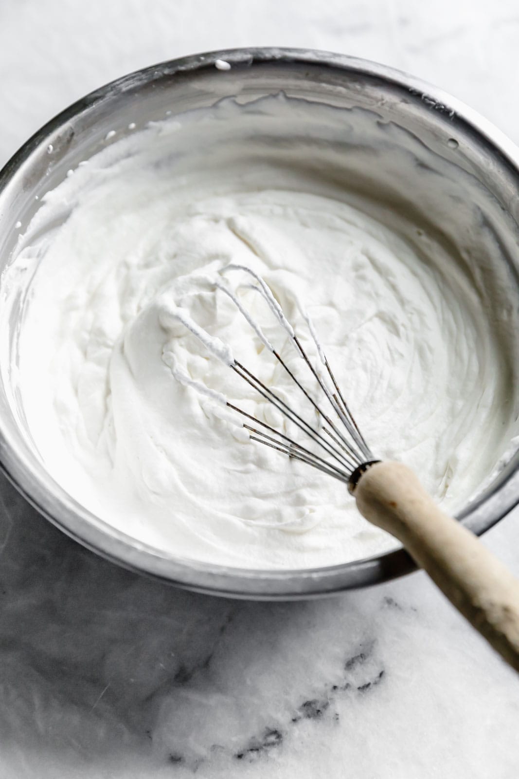 This creamy vanilla ice cream with fat blackberry swirls, buttery waffle pieces, and chocolate chips has us in heaven. Whip up this no churn blackberry waffle chocolate chip ice cream in minutes and skip the line at the ice cream shop.