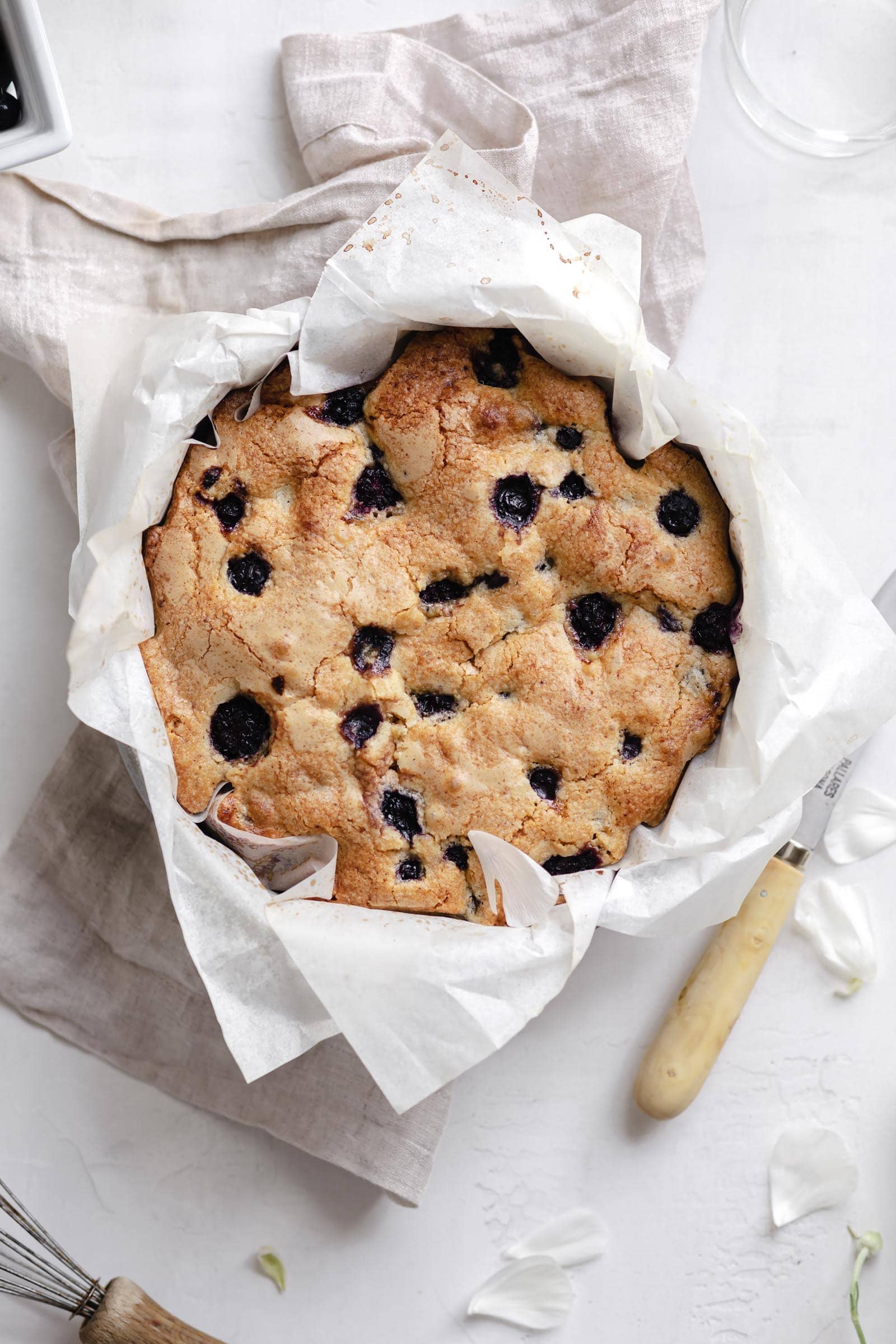 berry olive oil cake in a cake pan