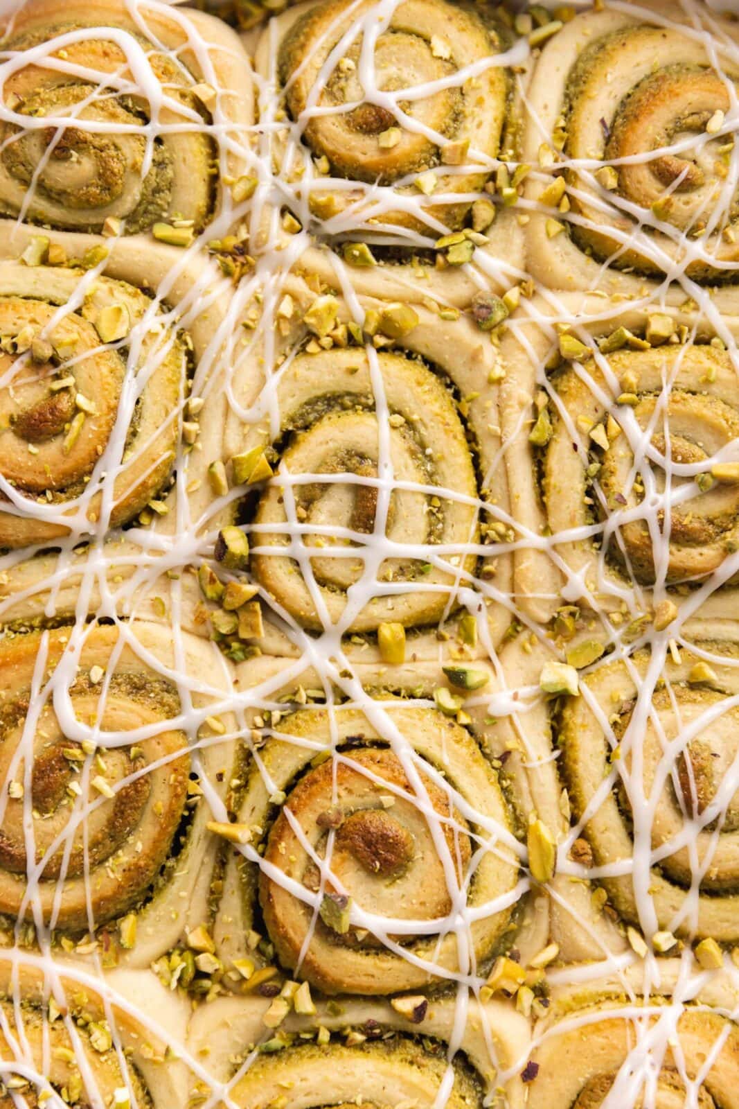 pistachios sweet rolls with drizzle