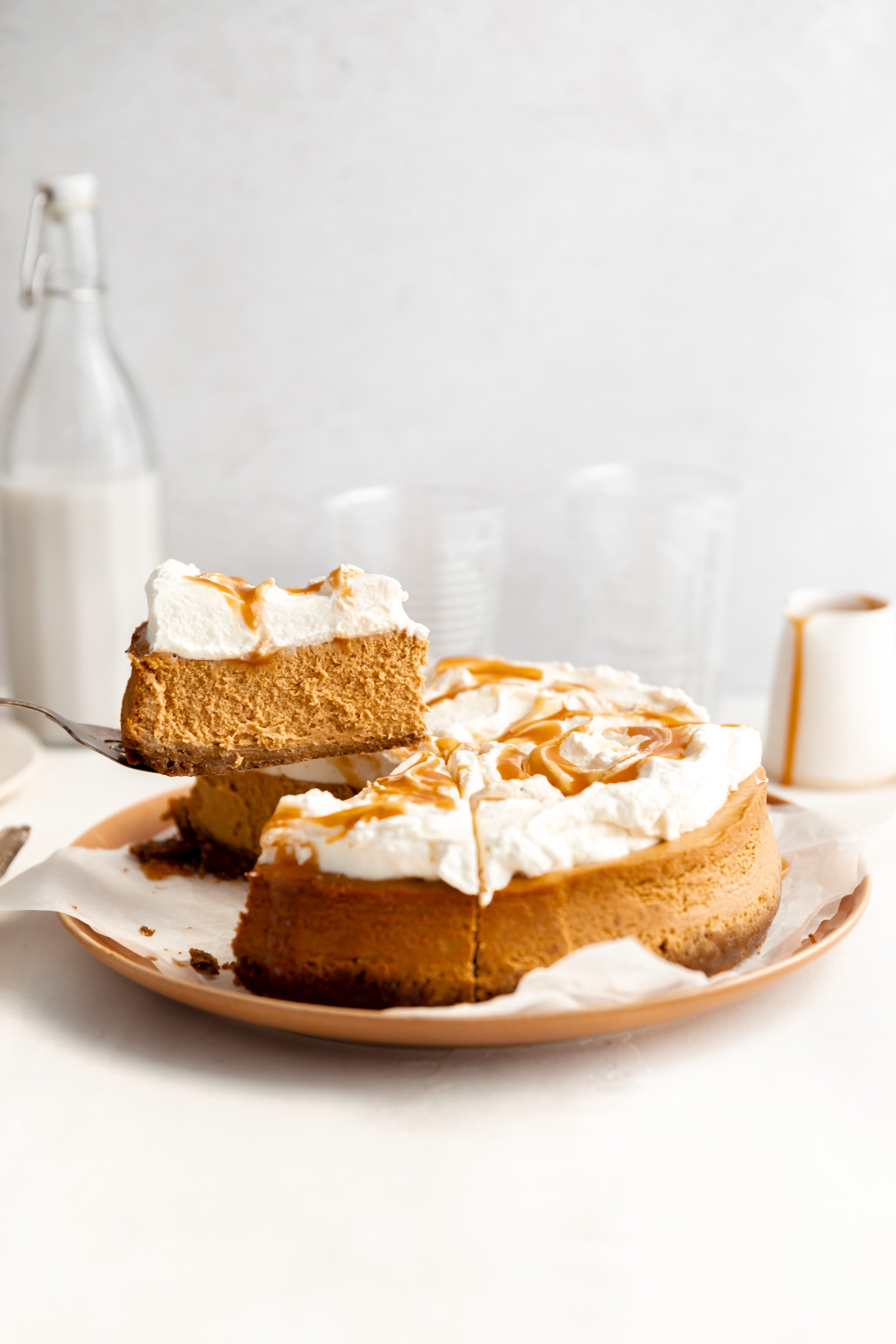 pumpkin caramel cheesecake with slice