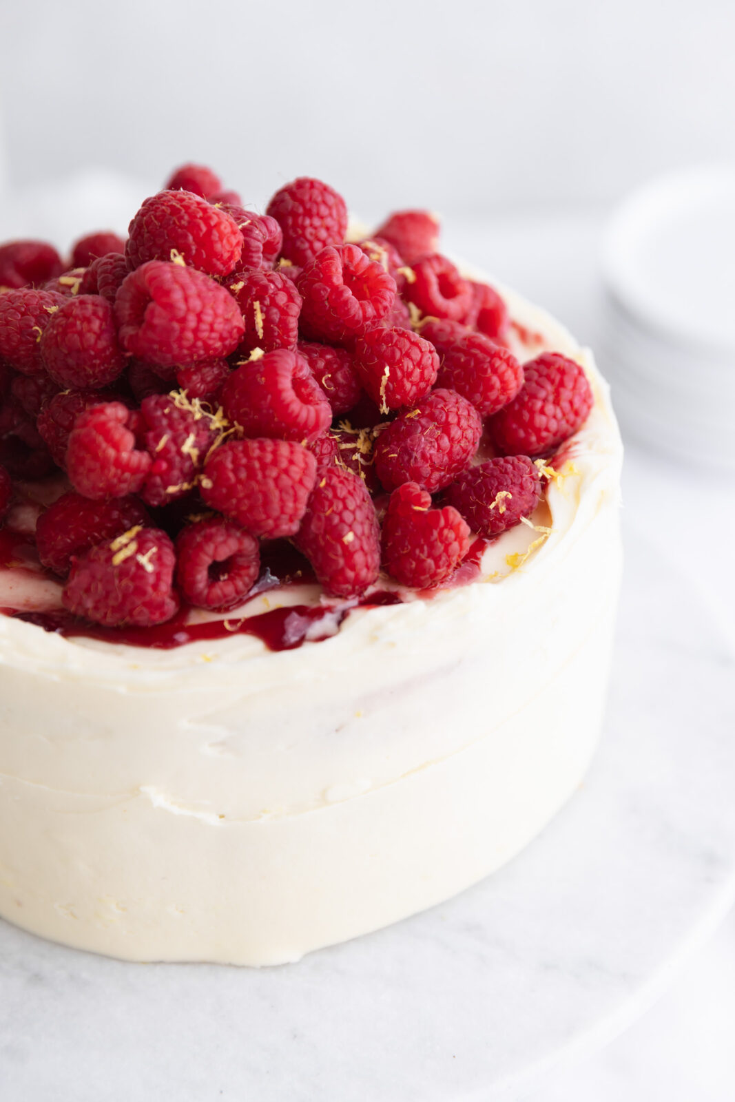 raspberry lemon cake with raspberries on top