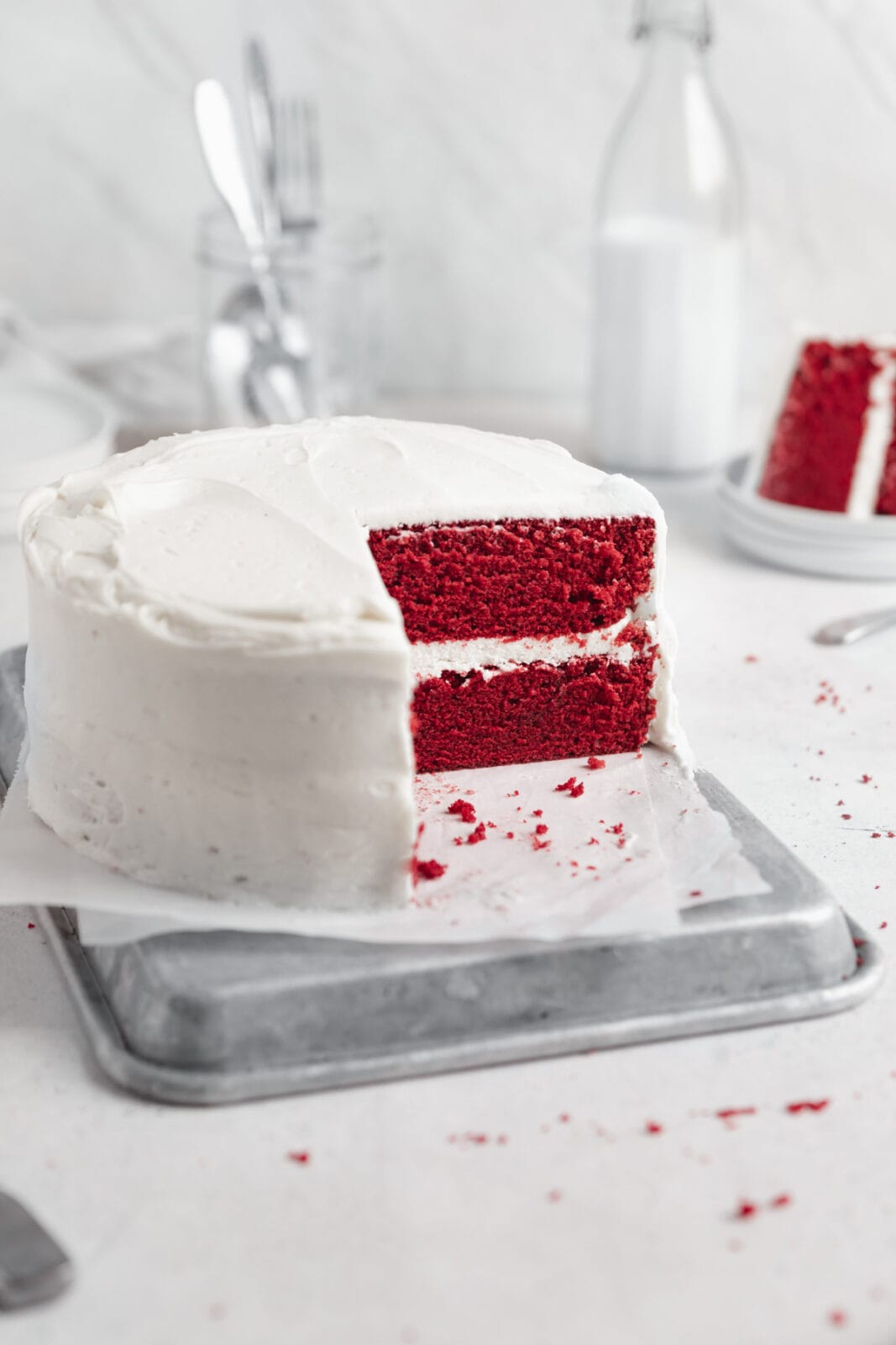 red velvet cake with slice taken out