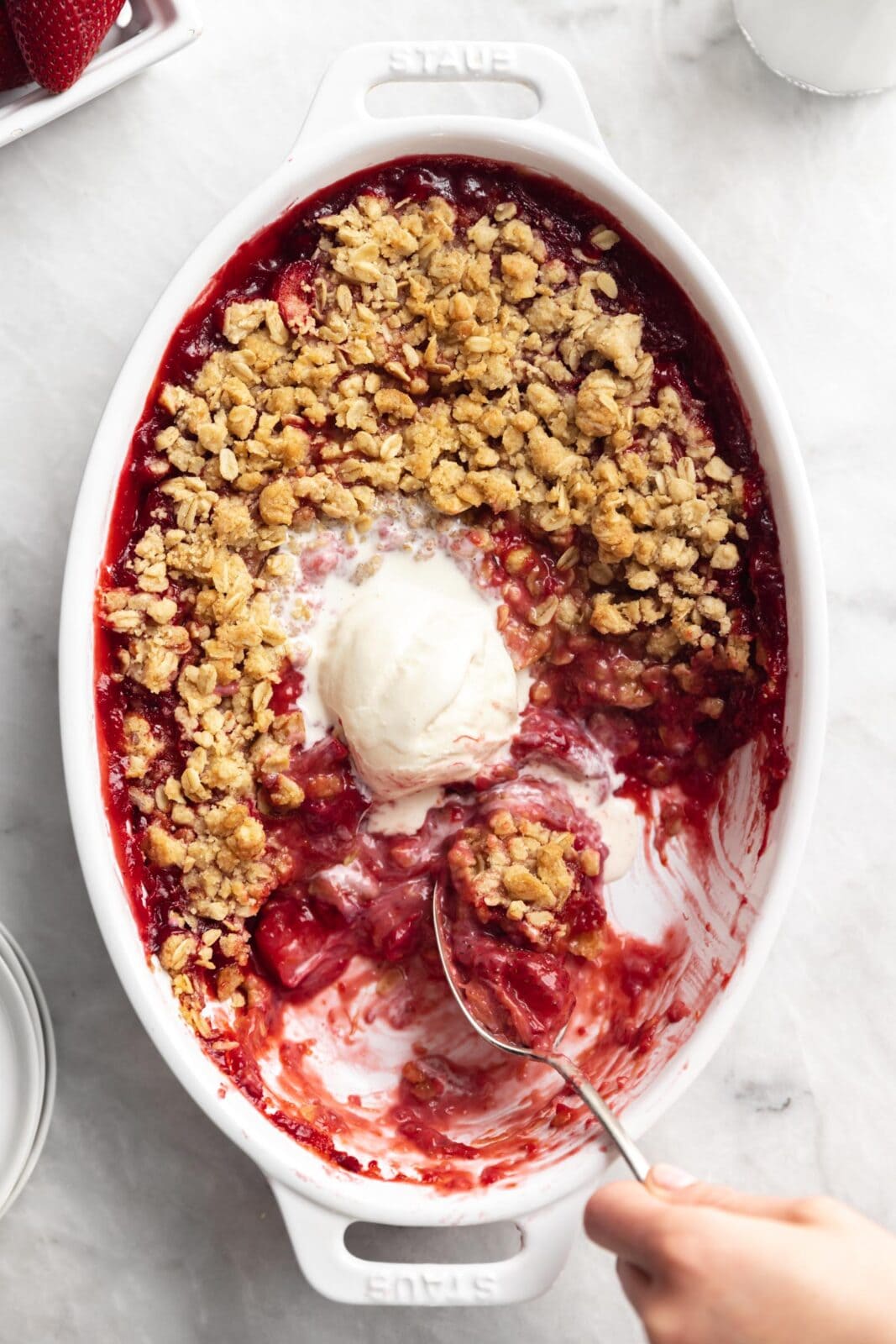strawberry rhubarb crisp with vanilla ice cream