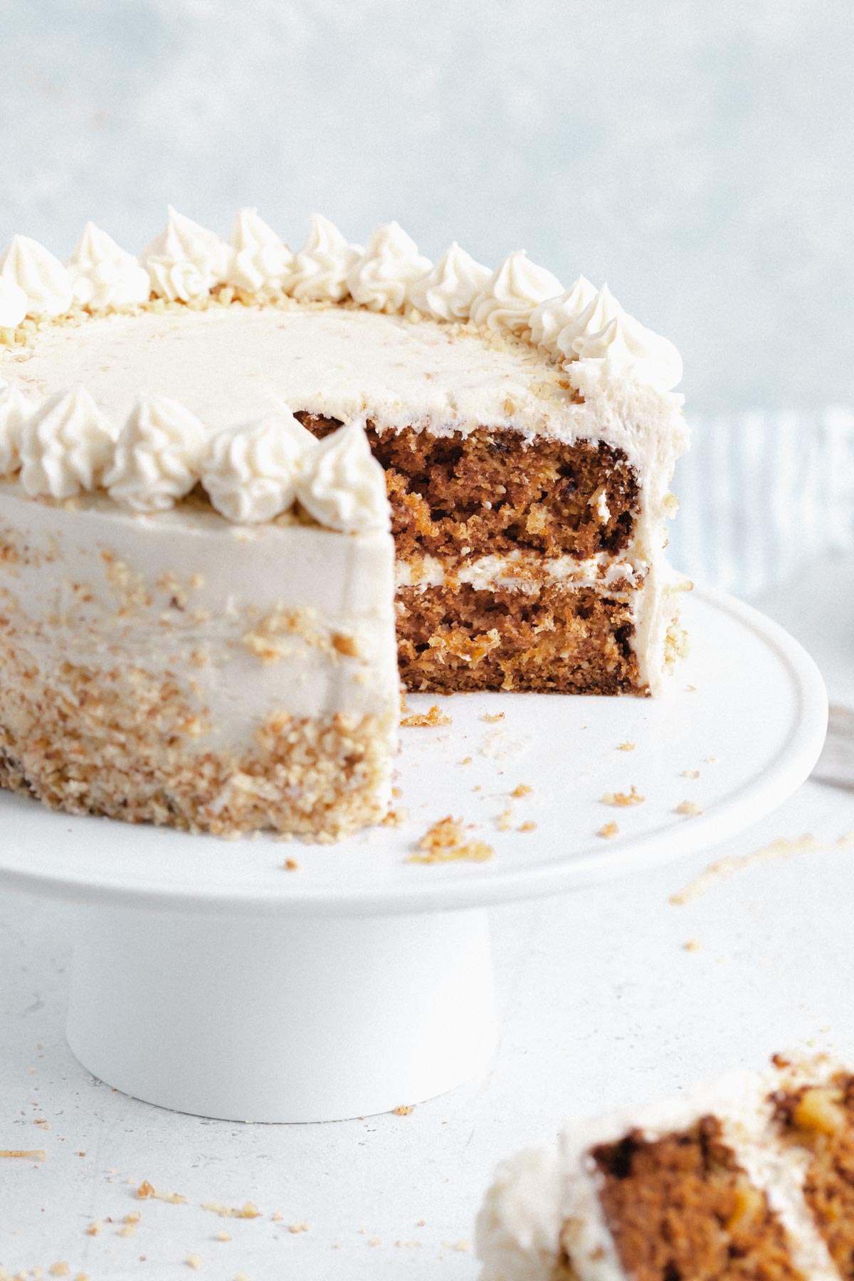 homemade carrot cake with a slice taken out