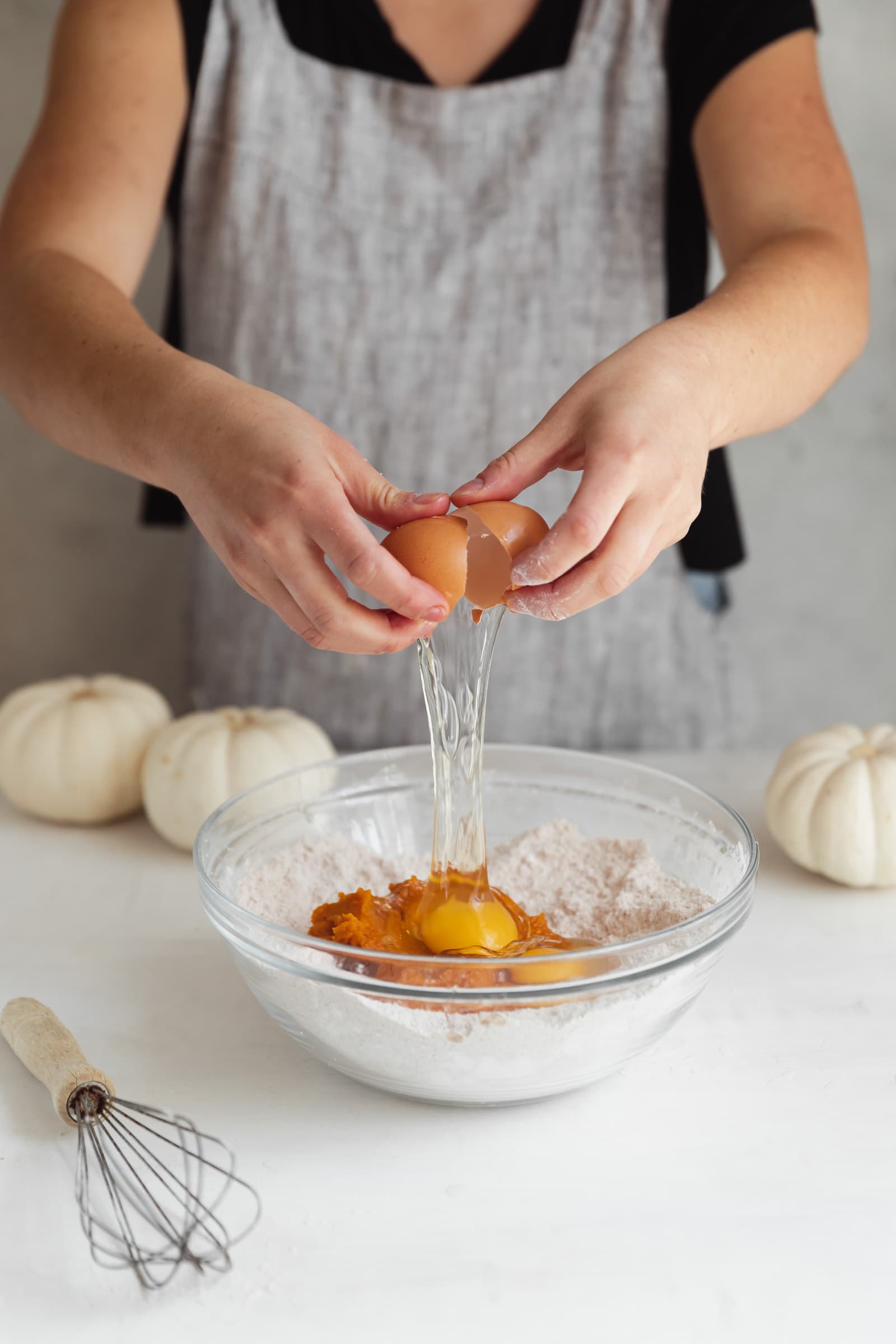 eggs going into a bowl