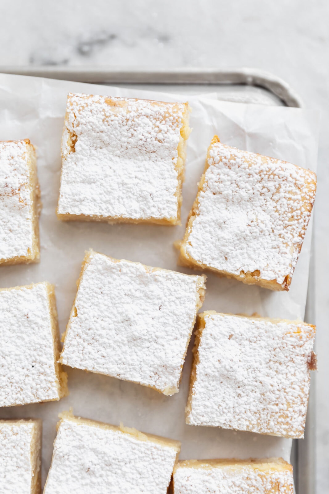 white chocolate brownies with powdered sugar